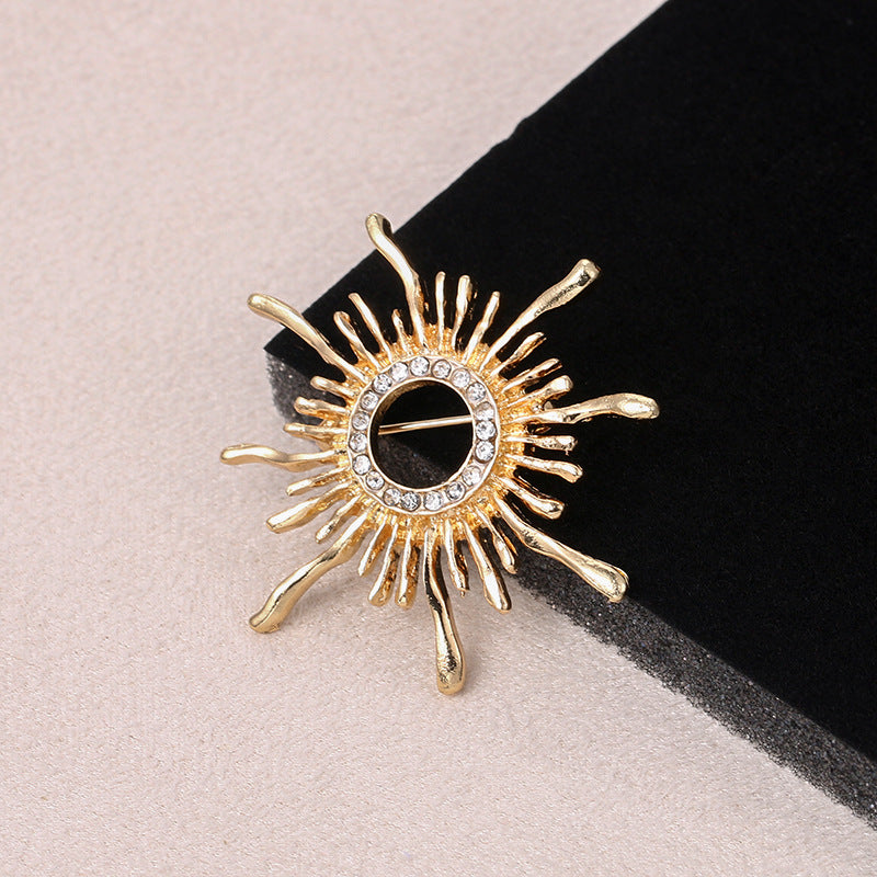 Sun brooch